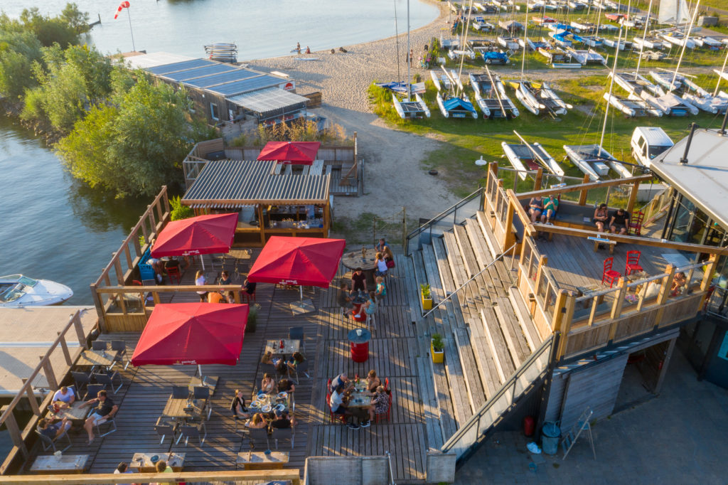 The terrace of the "Espresso Grand Café at the beach" on the catamaran beach of Marina Muiderzand